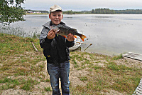 Fisherman with a perch